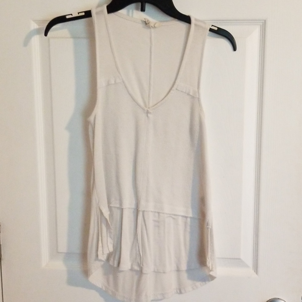 White crow cream tank